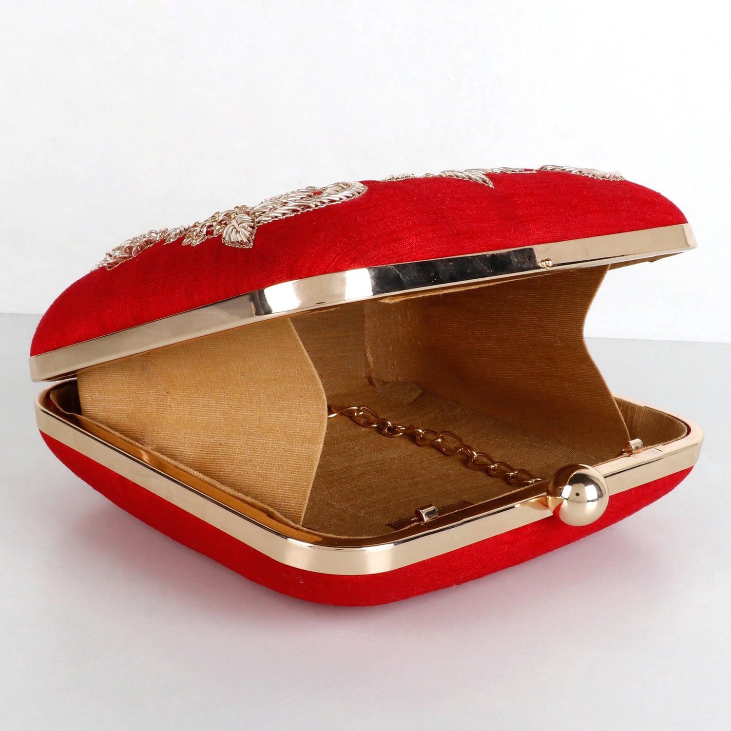 Over-The-Top Clutch | Singhvis