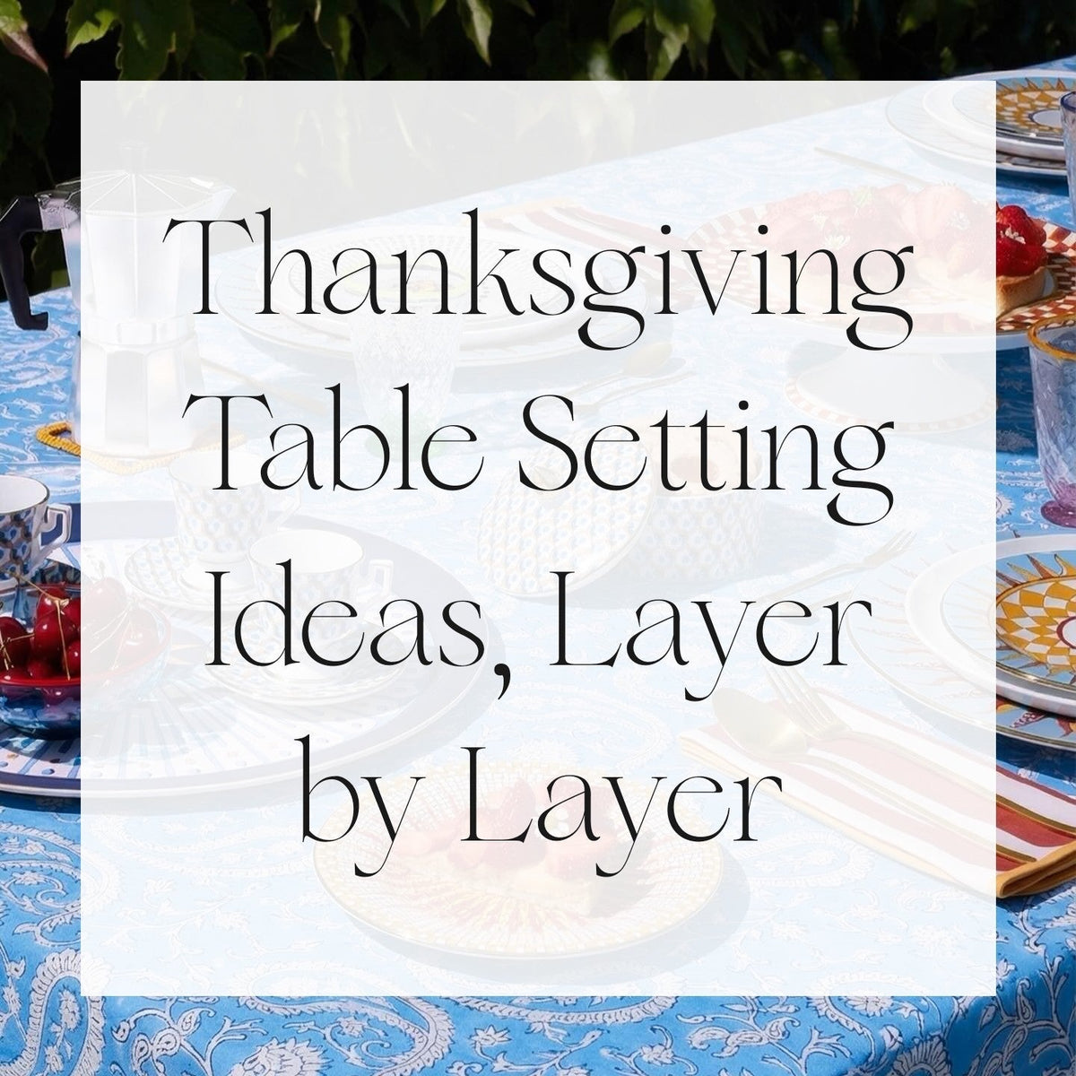 Thanksgiving Table Setting Ideas, Layer by Layer - a blue paisley block-printed cotton tablecloth on an outdoor table set with plates, cups and a moka pot